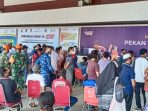 Serbuan vaksinasi yang digelar Lanud Silas Papare di Bandara Sentani.