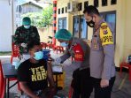 Kapolres Yapen saat meninjau vaksinasi presisi yang digelar Jajarannya.(Foto. Humas Polda Papua)