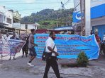Kompak saat menggelar aksi unjuk rasa di Kota Jayapura pada peringatan hari antikorupsi Internasional.(Foto. Istimewa)