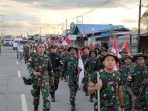 60 Personil baru Kodim 1711Boven Digoel saat mengikuti pawai menyambut Kemerdekaan RI ke-77. Salah satu cara orientasi masuk satuan.(Foto. Pendam XVIICenderawasih)